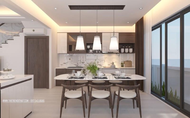Bộ bàn ghế và tủ bếp được làm từ gỗ óc chó tự nhiên tạo nên một vẻ đẹp đồng nhất nhưng vẫn mang lại sự độc đáo trong gian bếp hiện đại.