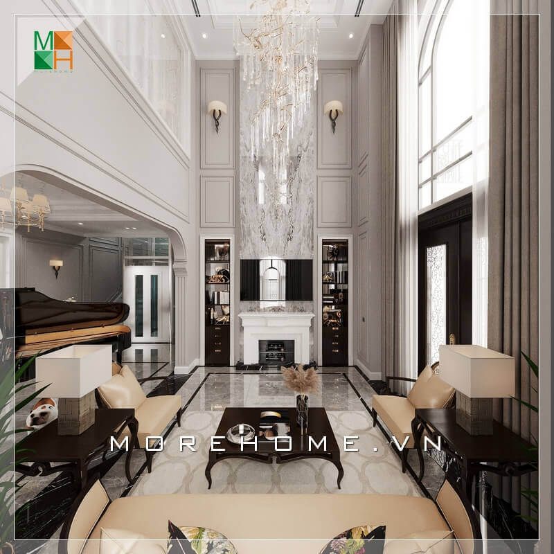 Không gian phòng khách được bày trí tinh tế bằng cách sử dụng đèn thả sang trọng, tạo ra sự hài hòa và phù hợp với phong cách phòng khách tân cổ điển.